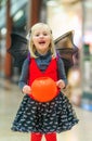 Happy girl with Halloween pumpkin Jack OÃ¢â¬â¢Lantern basket Royalty Free Stock Photo